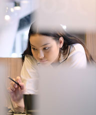 apprentice Intern teenage woman study business finance with senior staff.